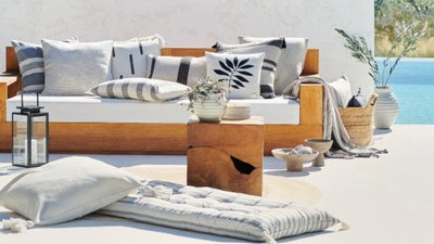 Assortment cushions outdoor seating bench