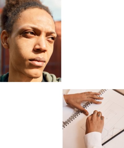 A photograph of Elton Gilbert, Sketching designs to translate to silkscreens