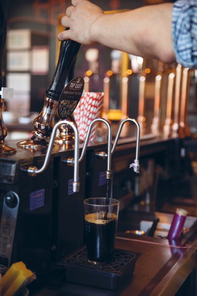 Man pouring pint
