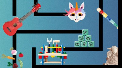 Children's Christmas presents including a guitar, unicorn mask, dice, wooden tool set, soft toy sheep and recorder