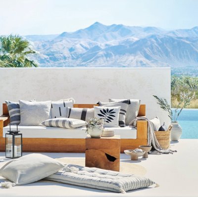 Assortment cushions outdoor seating bench