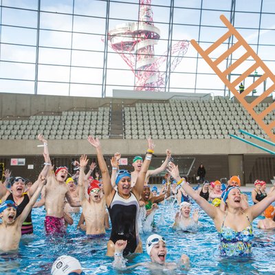 People in the London Aquatics Centre pool