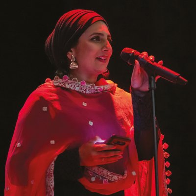 Person talking into microphone