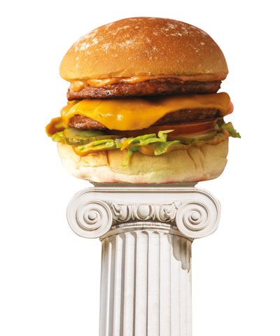 A burger on top of a column